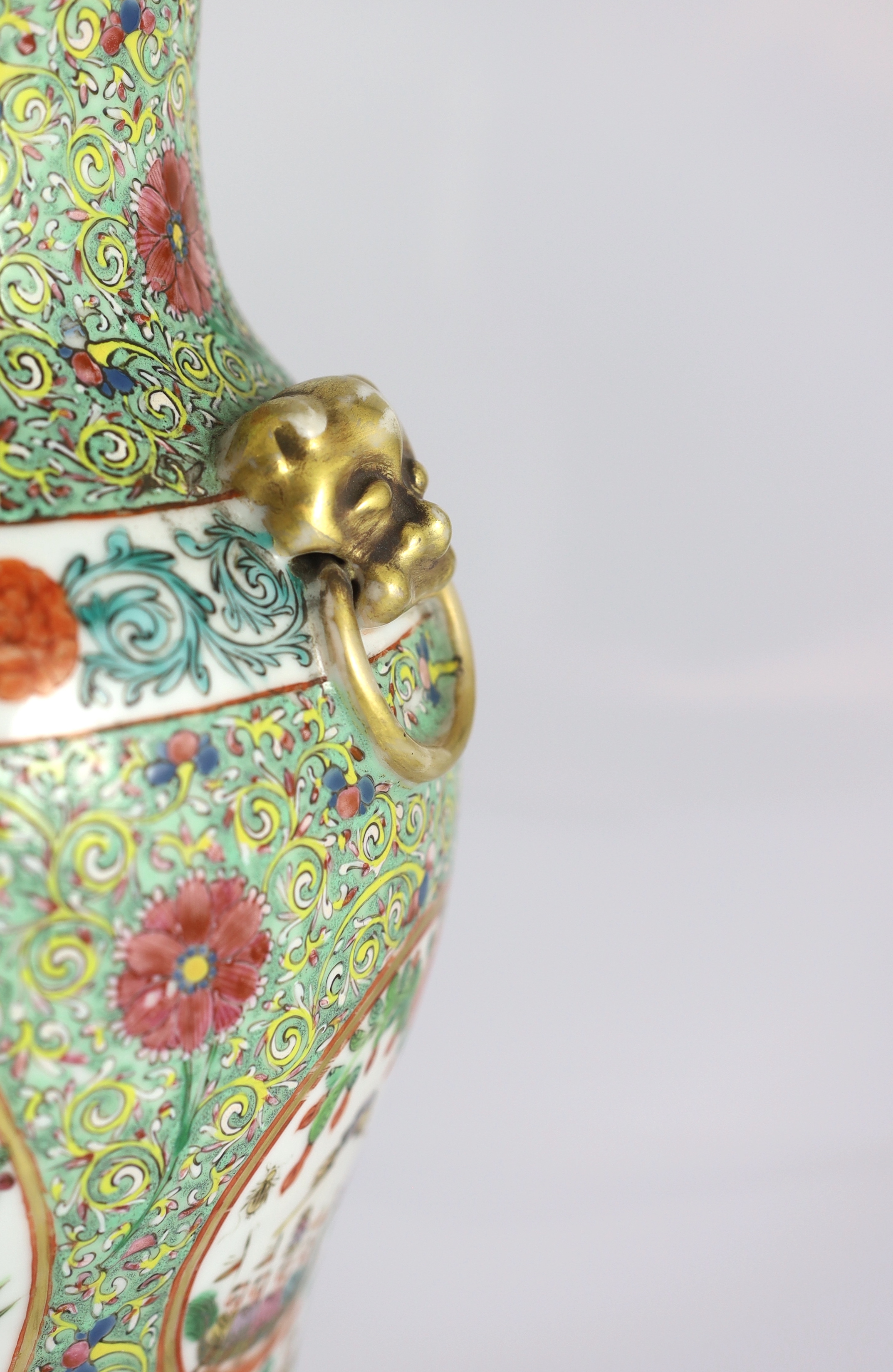 A pair of Chinese enamelled porcelain vases and covers, early 20th century